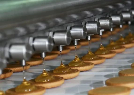 W jaki sposób maszyny do nadziewania ciastek zachowują proporcje składników?